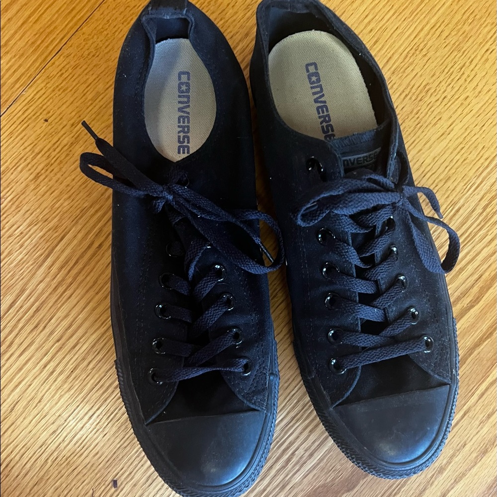 All black low cut Converse All Stars